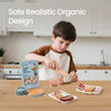 Child playing with wooden meat and seafood pretend food set in a toy kitchen