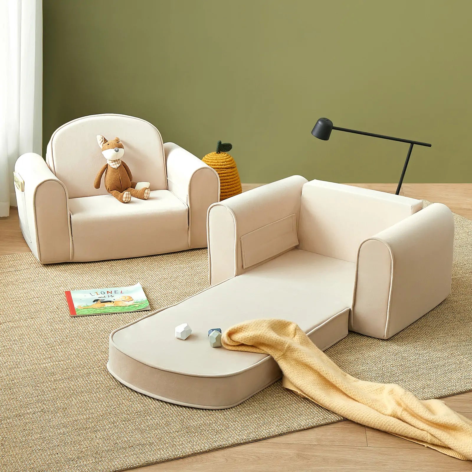 Close-up of the suede-like fabric and side pocket detail on the Tiny Land GentleSnug kids sofa chair