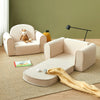 Close-up of the suede-like fabric and side pocket detail on the Tiny Land GentleSnug kids sofa chair
