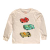 Beige long-sleeve shirt with colorful car illustrations on a white background