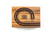 Wooden cribbage board with a clear background