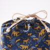 Side view of 14 by 18 inch cotton gift bag by Hannah Pearlman showing bag structure and handles