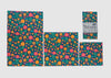 Set of colorful floral-patterned Meli Wraps on a light gray background