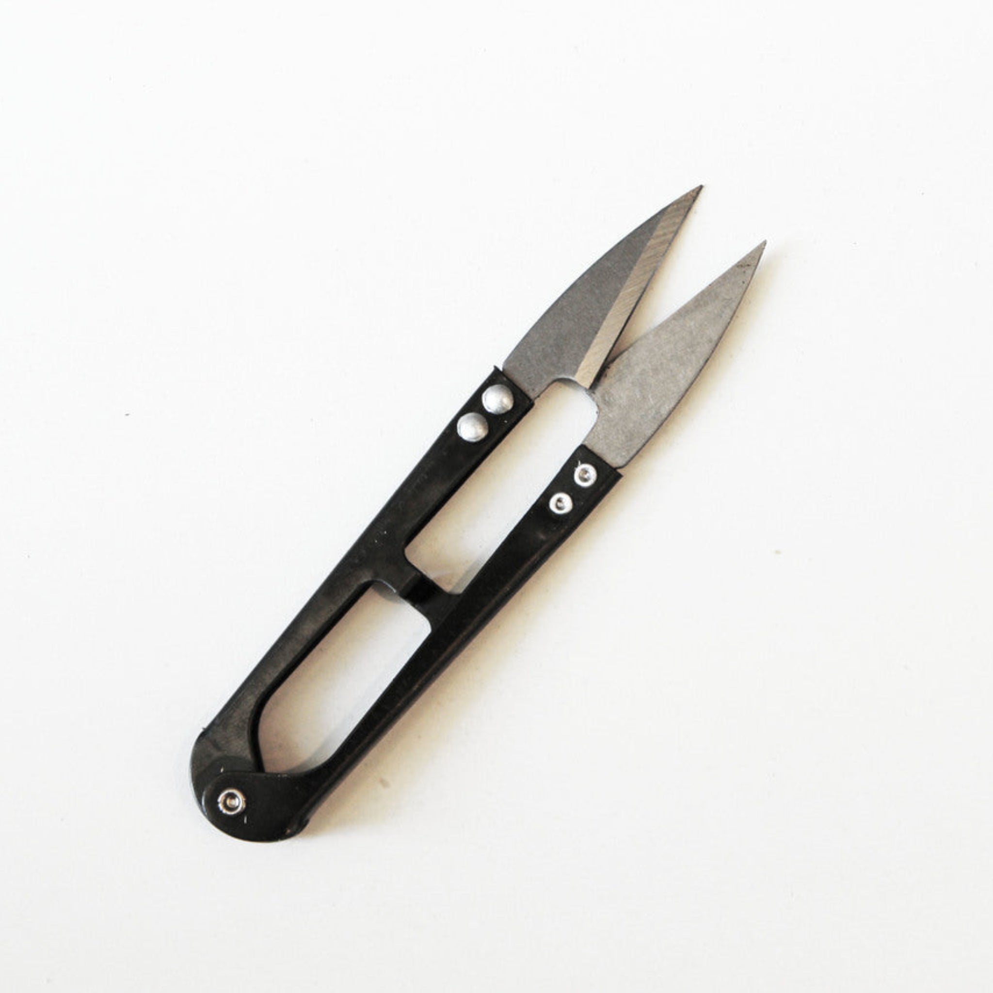 Two small pocket knives with black handles on a white background