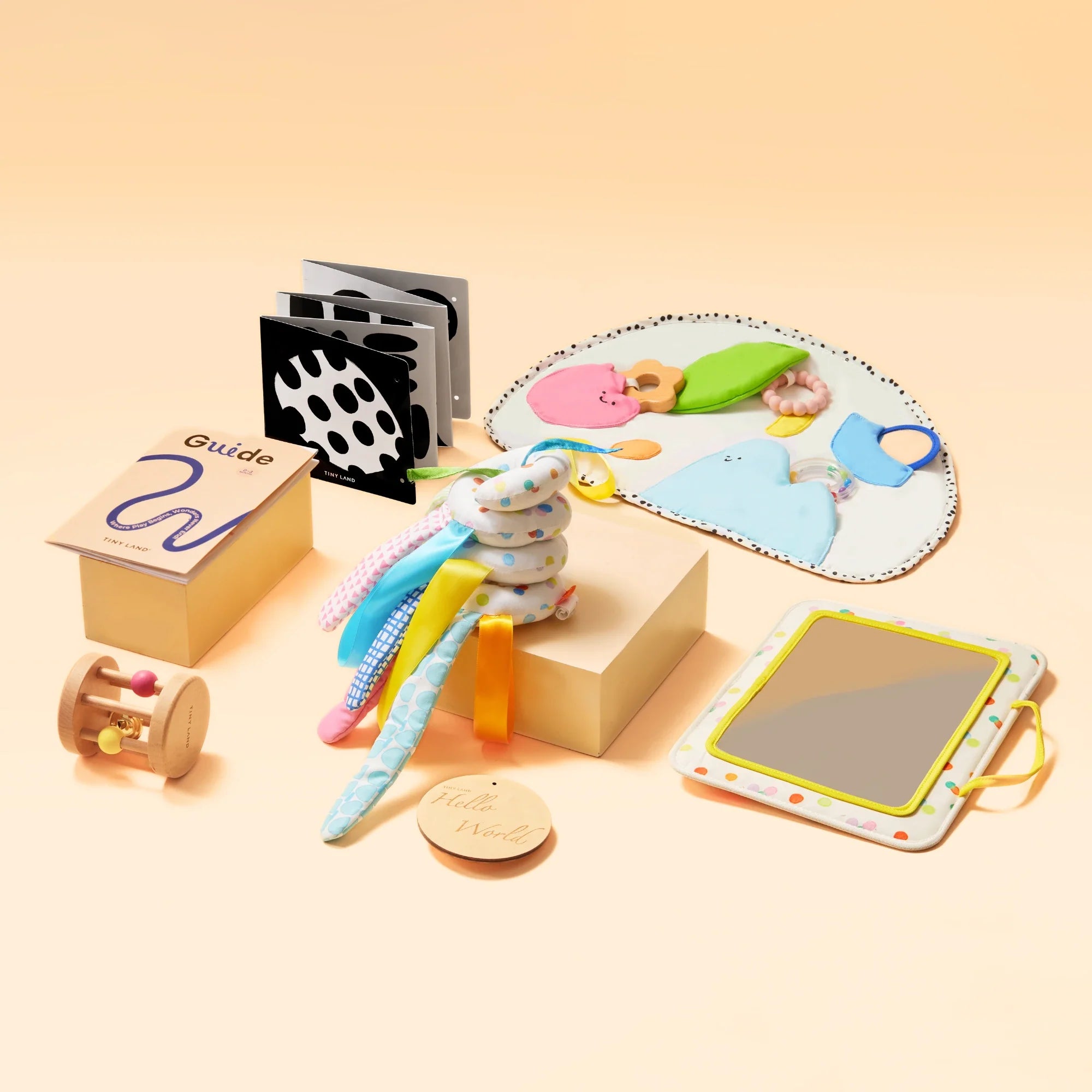 Collection of educational toys and materials on a beige background