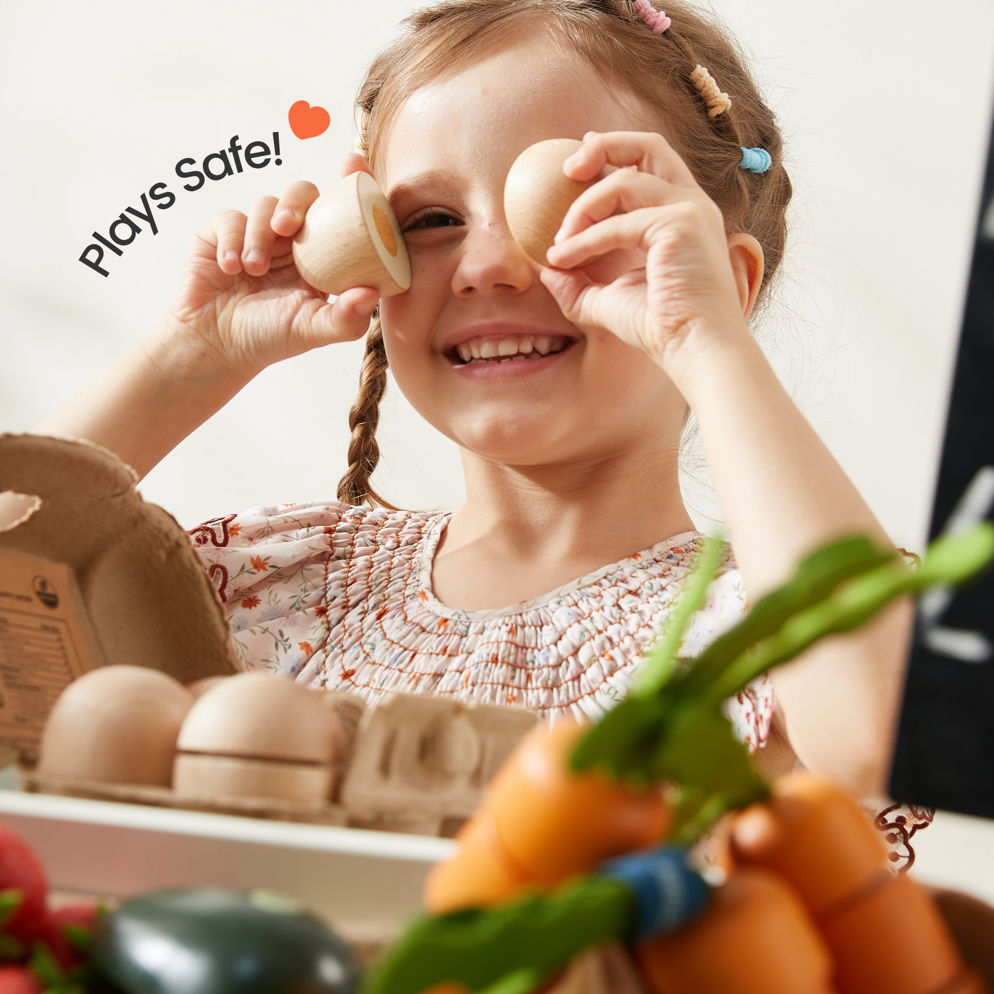 Tiny Land organic play food set showing velcro chop-and-cut wooden food pieces for toddlers