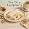 Tea Time Companion with tea, honey, and a gluten-free tag on a light background