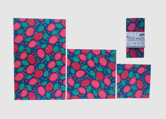 Set of reusable wraps with fruit pattern on a white background