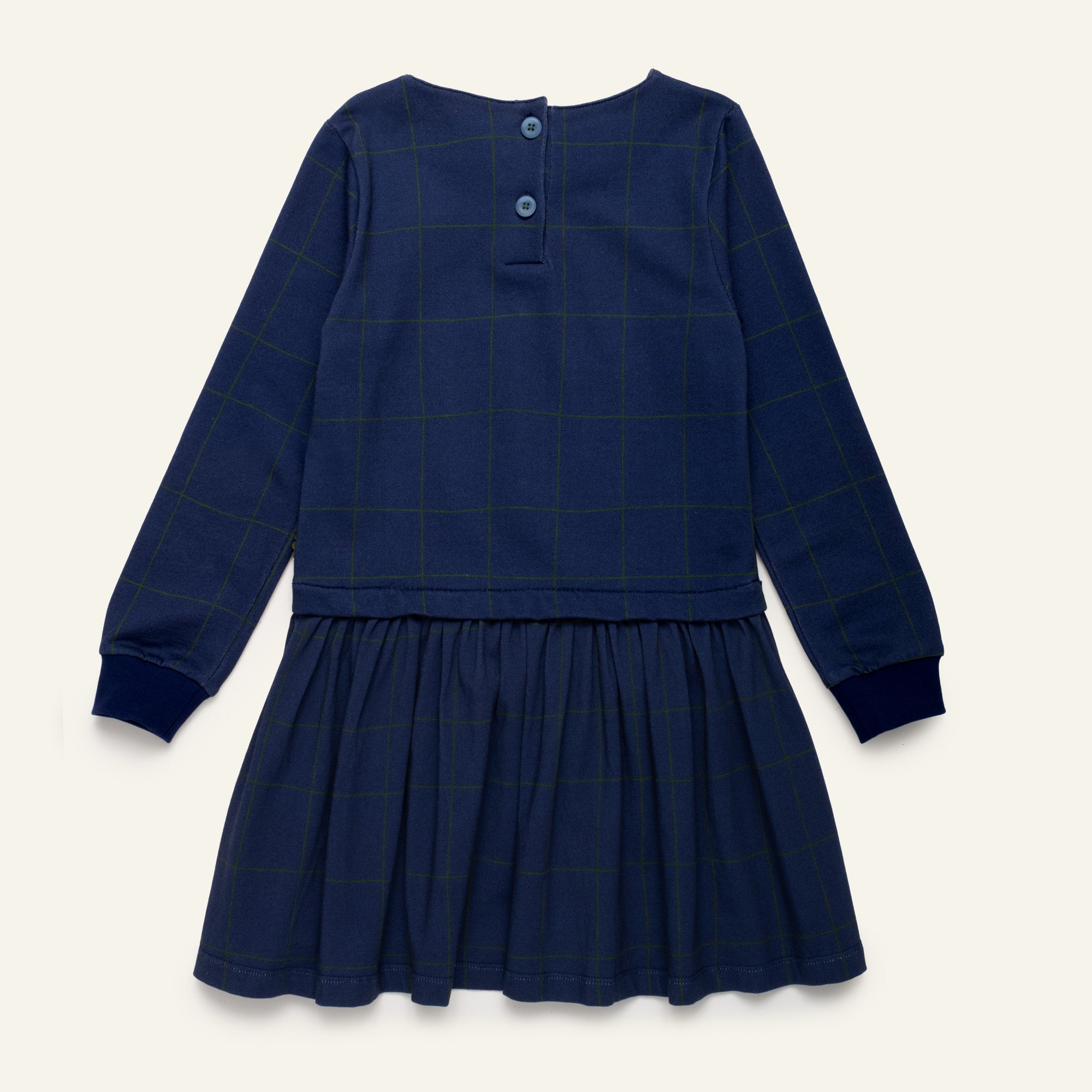 Close-up detail of the Mon Coeur Kids Navy Grid Dress crafted from soft organic and recycled fabric
