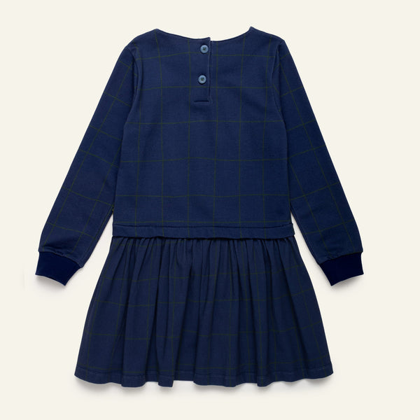 Close-up detail of the Mon Coeur Kids Navy Grid Dress crafted from soft organic and recycled fabric