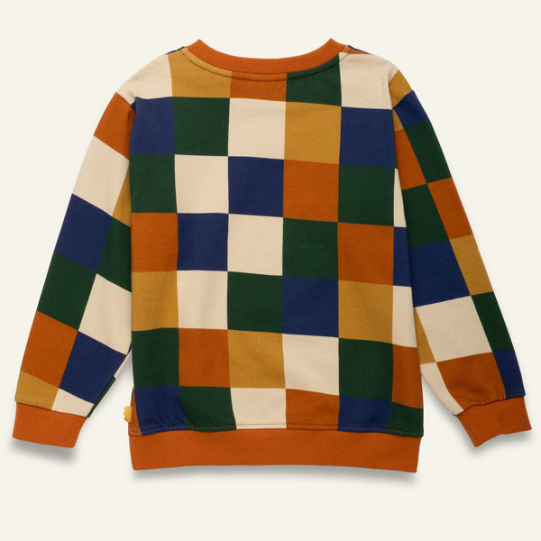 Mon Coeur Kids Fall Checkered Sweatshirt laid flat, showcasing the bold autumn checker print and soft cotton blend construction