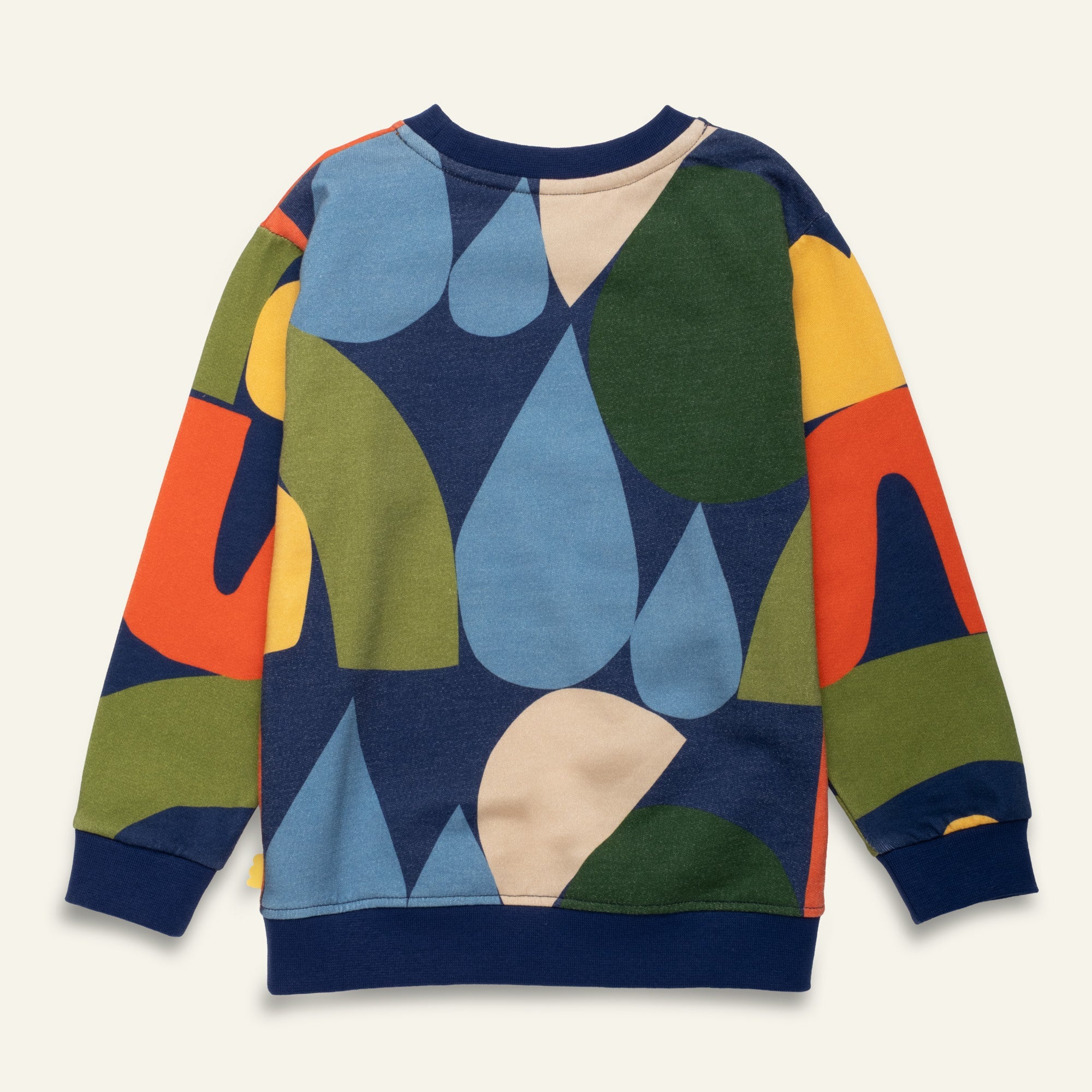 Close-up view of the Mon Coeur Fall Shapes Sweatshirt showing the seasonal print detail on organic recycled cotton fabric