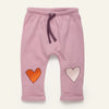Mon Coeur Heartfelt Baby Jogger in organic and recycled cotton with embroidered heart detail at the knees, sizes 1Y–3Y