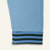Mon Coeur Blue Jogger detail view showing contrast back pocket and green striped cuffs