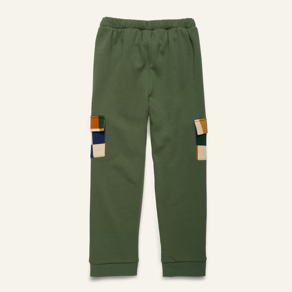 Green pants with colorful patchwork on a white background