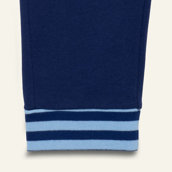 Close-up of a blue sweatshirt with light blue stripes on a white background