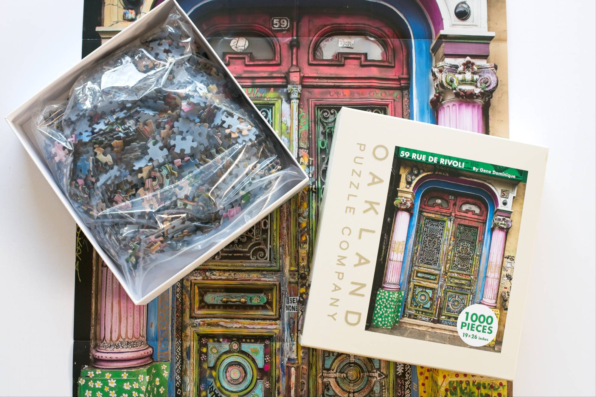 Open box of the 59 Rue de Rivoli jigsaw puzzle from Oakland Puzzle Company