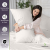 Woman holding a large white pillow with sustainability features listed on the left.