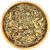 Wooden bowl filled with dried herbs on a white background