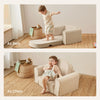 Child playing on a multi-functional furniture piece that can be used as a bed or chair.