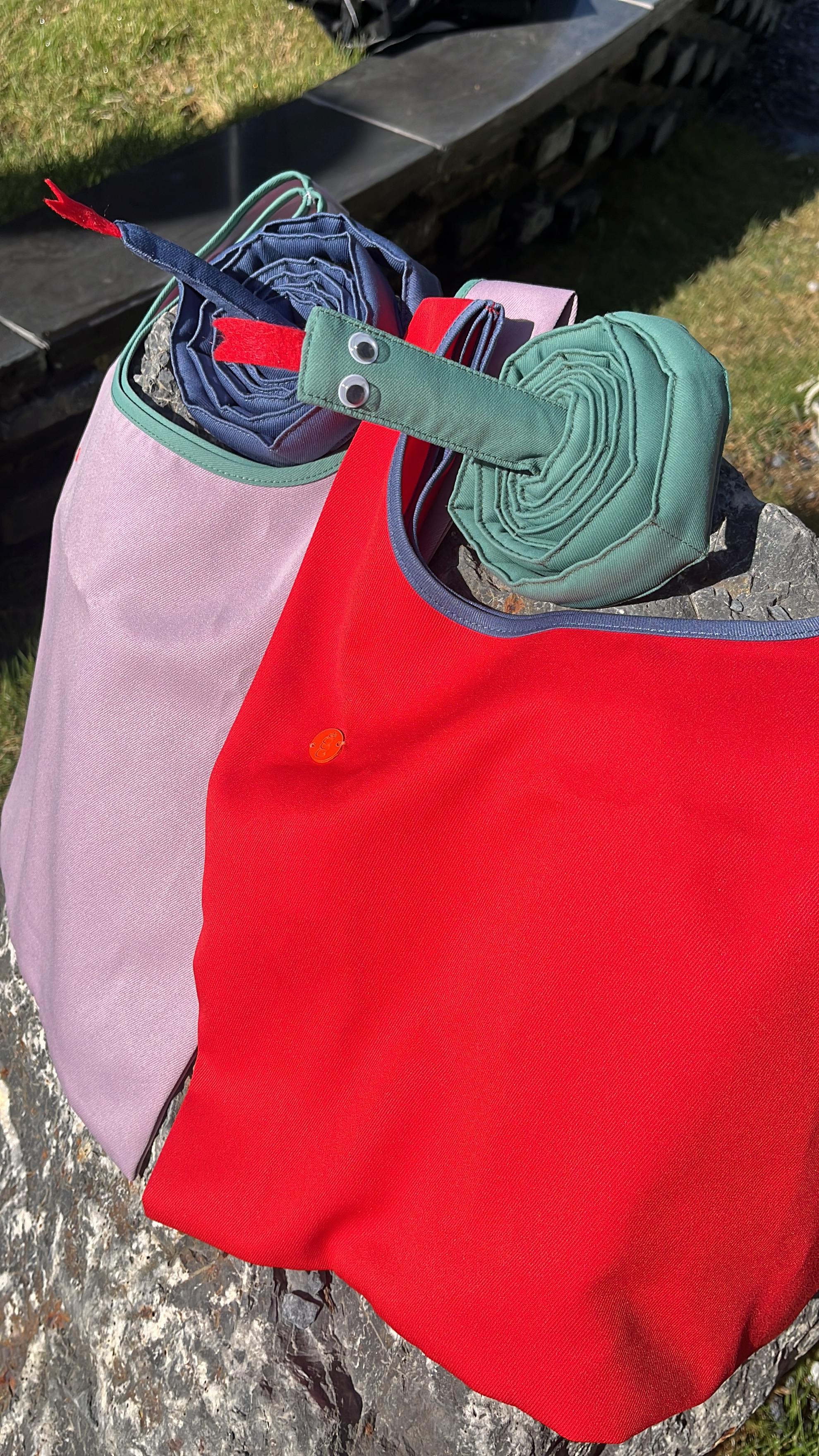 HowBottle Lunar New Year limited edition bags with straps displayed together on a stone surface