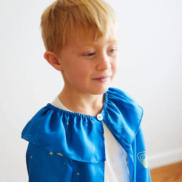 Detail view of the heavyweight mulberry silk fabric and star pattern on the cape