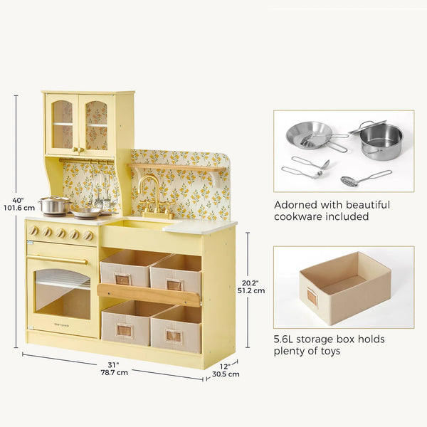 A children's play kitchen set shown on a light gray background with dimension callouts and inset photos. The main product is a pastel yellow wooden kitchen unit with floral wallpaper, a sink, oven, drawers, and countertop accessories.
