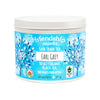 Tea canister with blue label featuring 'friendship organics' branding on a white background