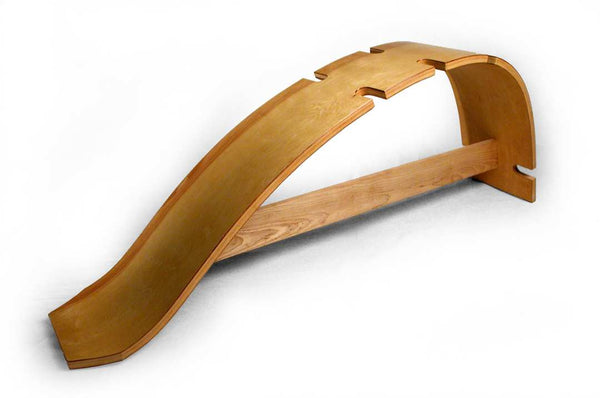 Side view of The Whale wooden back stretcher bench showing curved spine support design