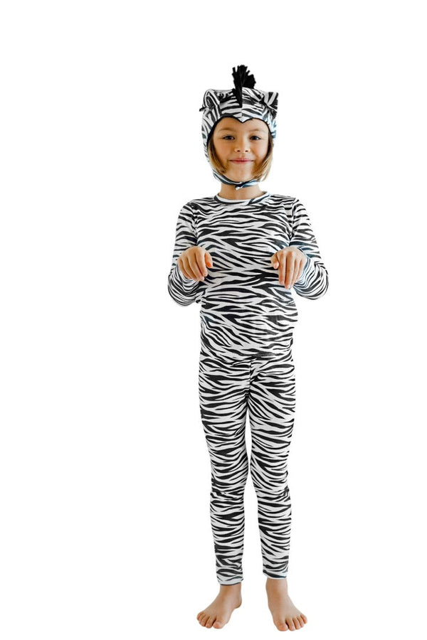 Child wearing a zebra costume with a headpiece on a white background