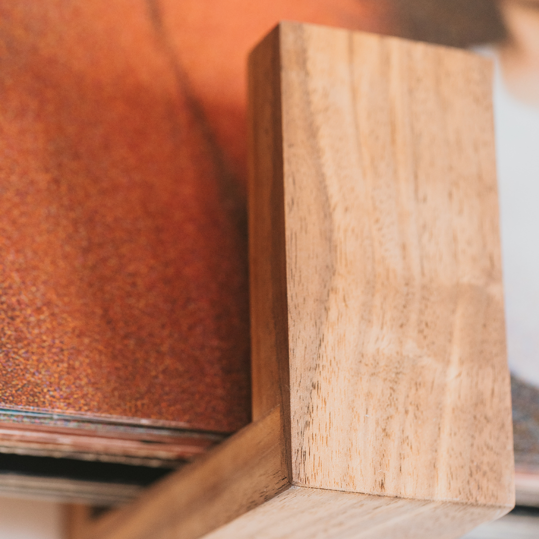 Close-up of a wooden block on a blurred background