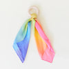 Sarah's Silks Rainbow Teether with colourful mini rainbow playsilk knotted onto a solid Maple wood ring