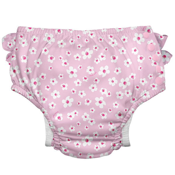Eco Snap Ruffled Swim Diaper - gussets, recycled, UPF 50+, easy snaps. Stress-free swimming! Protect your baby, planet with adorable style. Shop now & splash worry-free!