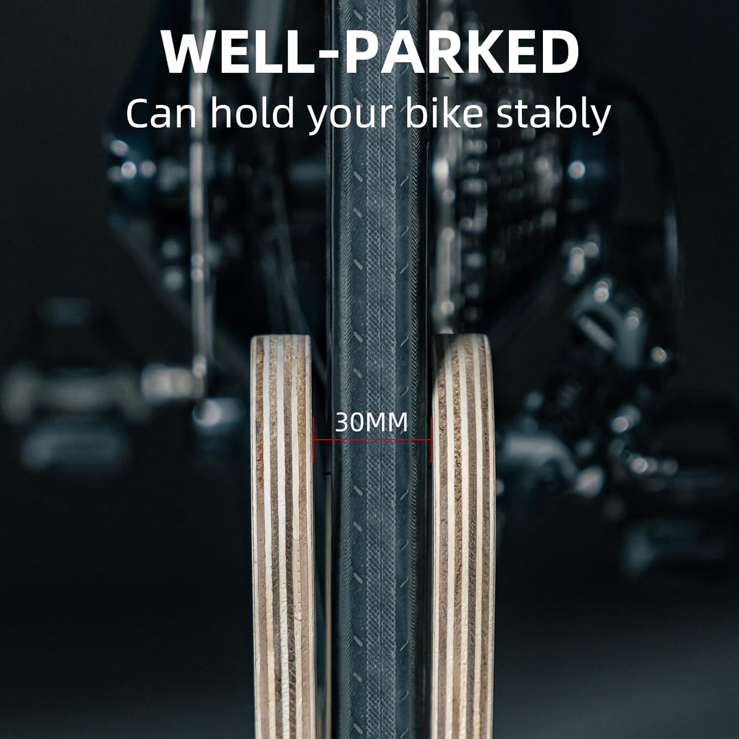 Bicycle tire with text indicating stability and tread depth on a dark background