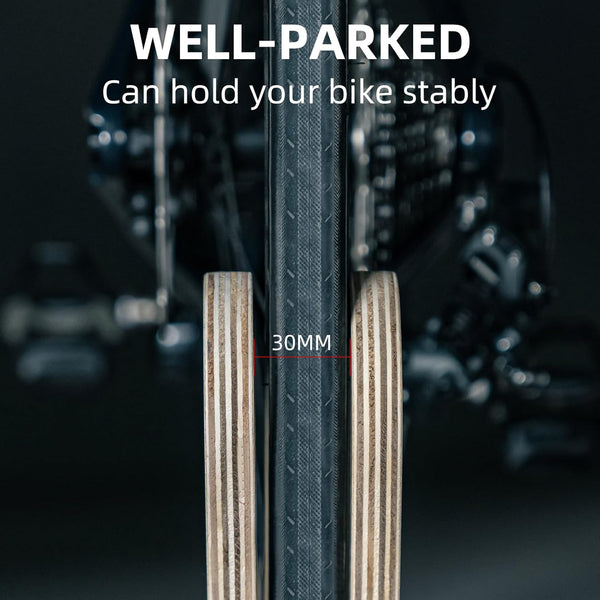 Bicycle tire with text indicating stability and tread depth on a dark background