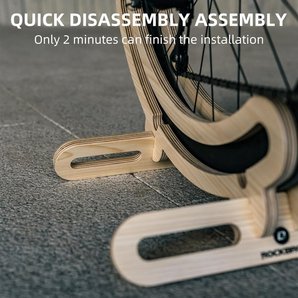 Quick disassembly assembly tool with bicycle wheel on a concrete floor
