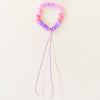 Sarah's Silks Blossom Garland styled with matching Blossom Collection cape and skirt for creative play