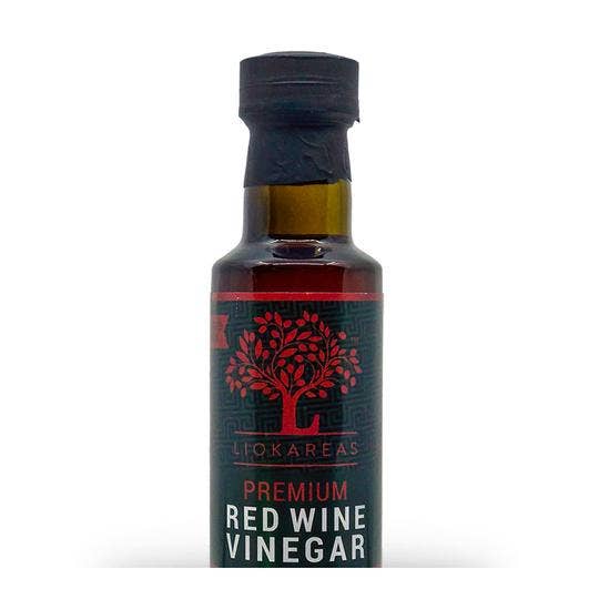 Close-up of Liokareas red wine vinegar label showing Greek origin and traditional recipe details