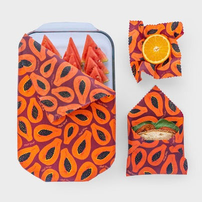 Meli Wraps beeswax food wrap in Purple Papaya print laid flat