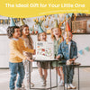 Children at a birthday party with a wooden train set and 'Tiny Land' branding.