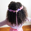 Sarah's Silks Blossom Garland worn around the waist as a silk skirt accessory for kids