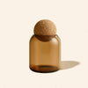 Translucent amber 7oz Luna™ candle vessel with cork lid by makesy®