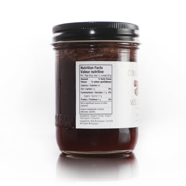 USDA Organic and B Corp certified cinnamon honey with EcoCert and Fair Trade Federation logos