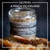 Indulge your senses with Icelandic Licorice Salt. This unique blend of sea salt and licorice root offers a surprising and delicious flavor experience. Perfect for elevating your dishes, from sweet treats to savory meats. Experience the magic of Iceland with every sprinkle.