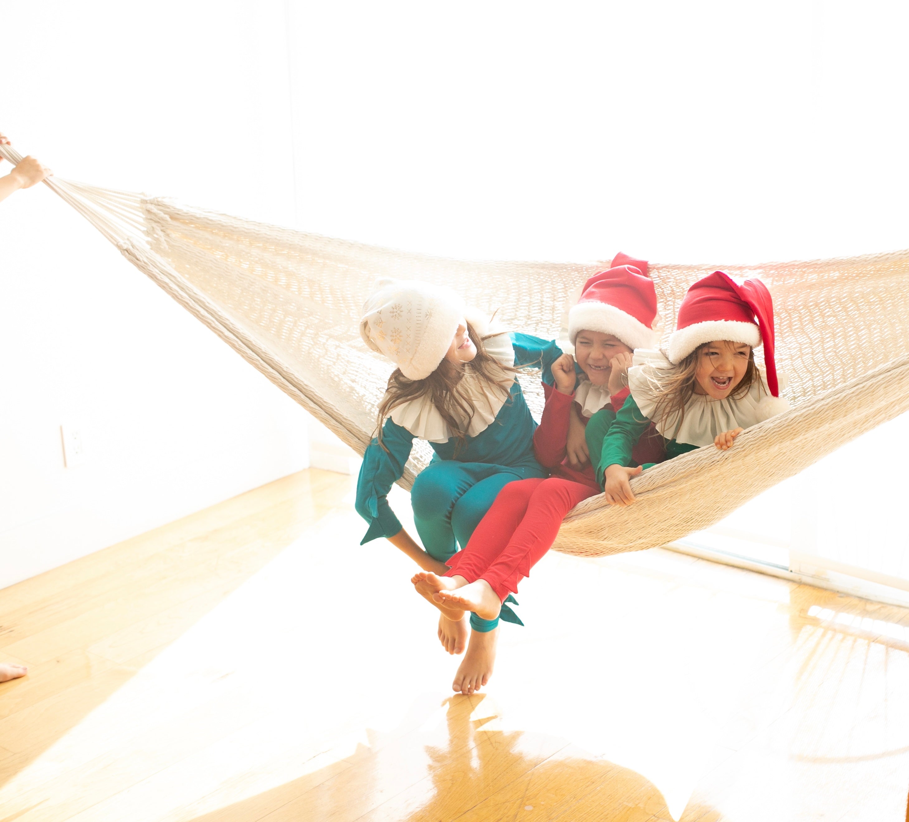 Child wearing the Jade Holiday Elf cotton pajama costume