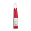 Red candles in a white packaging with 'Bluecorn' branding on a white background