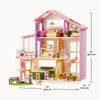Pink dollhouse with furniture and measurements on a white background