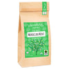 Bag of Friendship Organics Moroccan Mint green tea with a green label on a white background