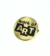 Close-up of Work of Art brass pin — a meaningful affirmation gift under $20 from Fair Anita