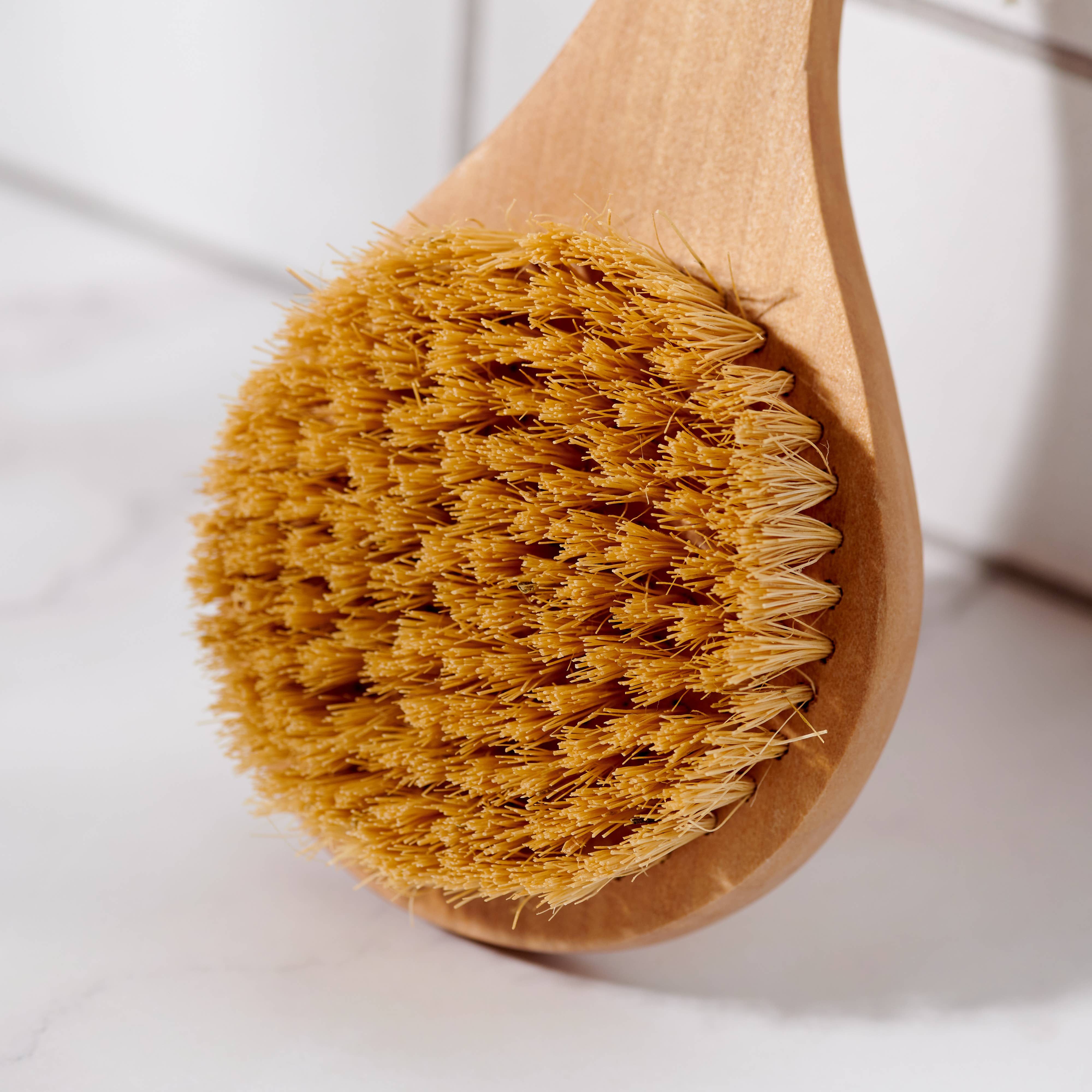 Bamboo dry body brush with natural sisal bristles — exfoliates, boosts circulation & supports lymphatic drainage. Plastic-free, zero waste & eco-friendly. Shop now.